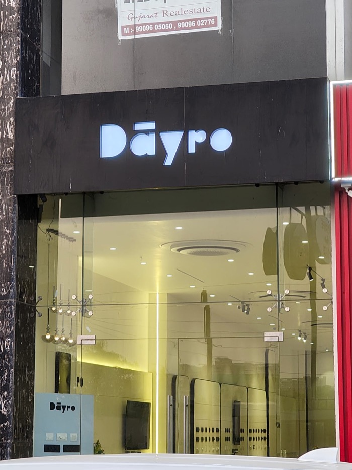 The front of Dayro's store, with its name lit up